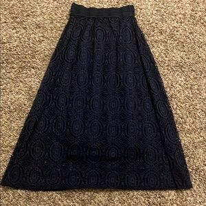 Bohemian Navy Maxi Skirt with unique eyelet design.
